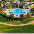 Well-maintained HOA community common areas funded by HOA fees in a Texas neighborhood